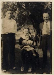 Left to Right: grandson Jay, daughter Florence with great granddaughter Janet, and William F. Carter